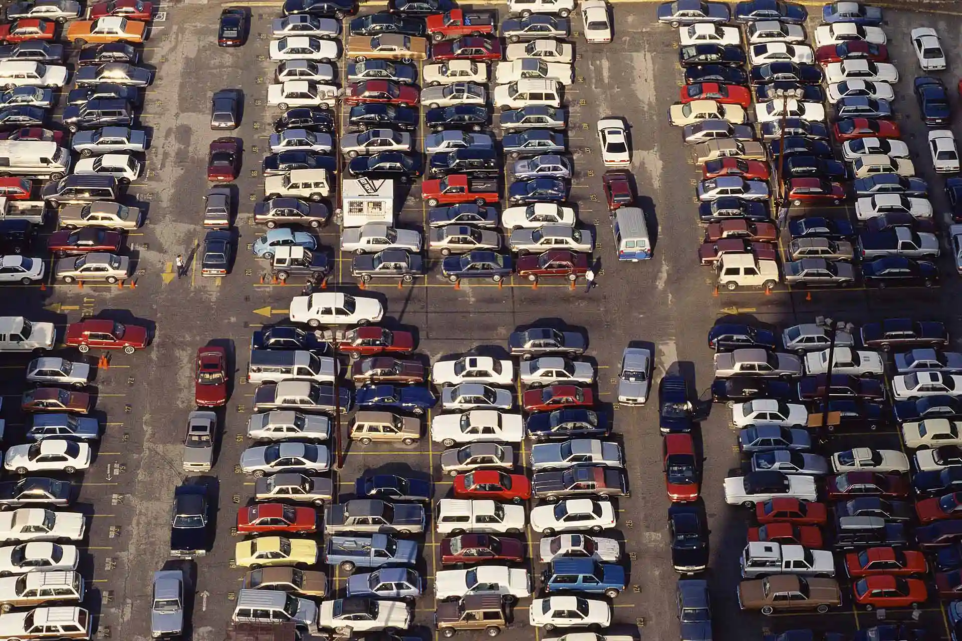 A parking lot filled beyond capacity