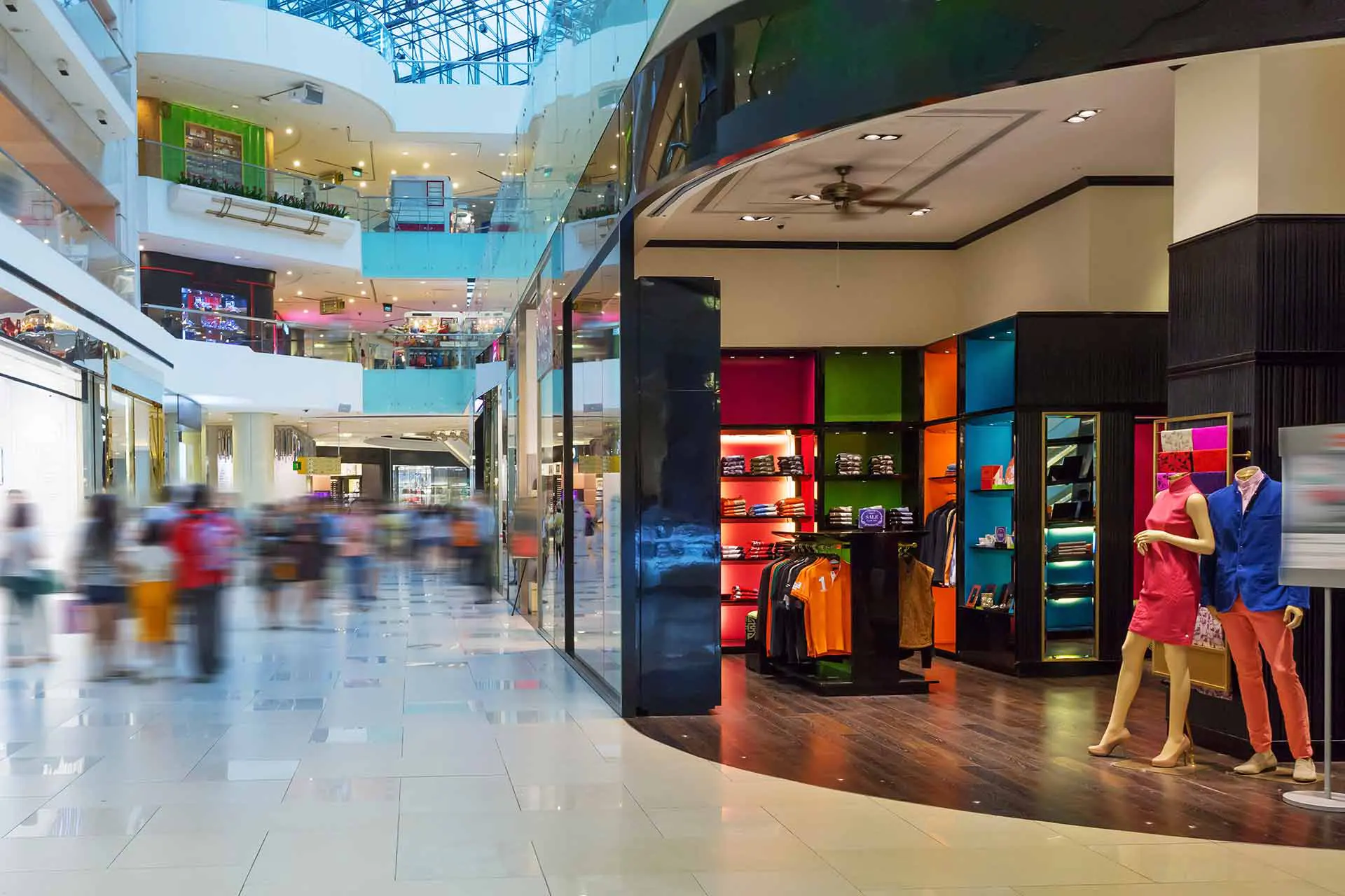 A busy bright shopping mall during the day