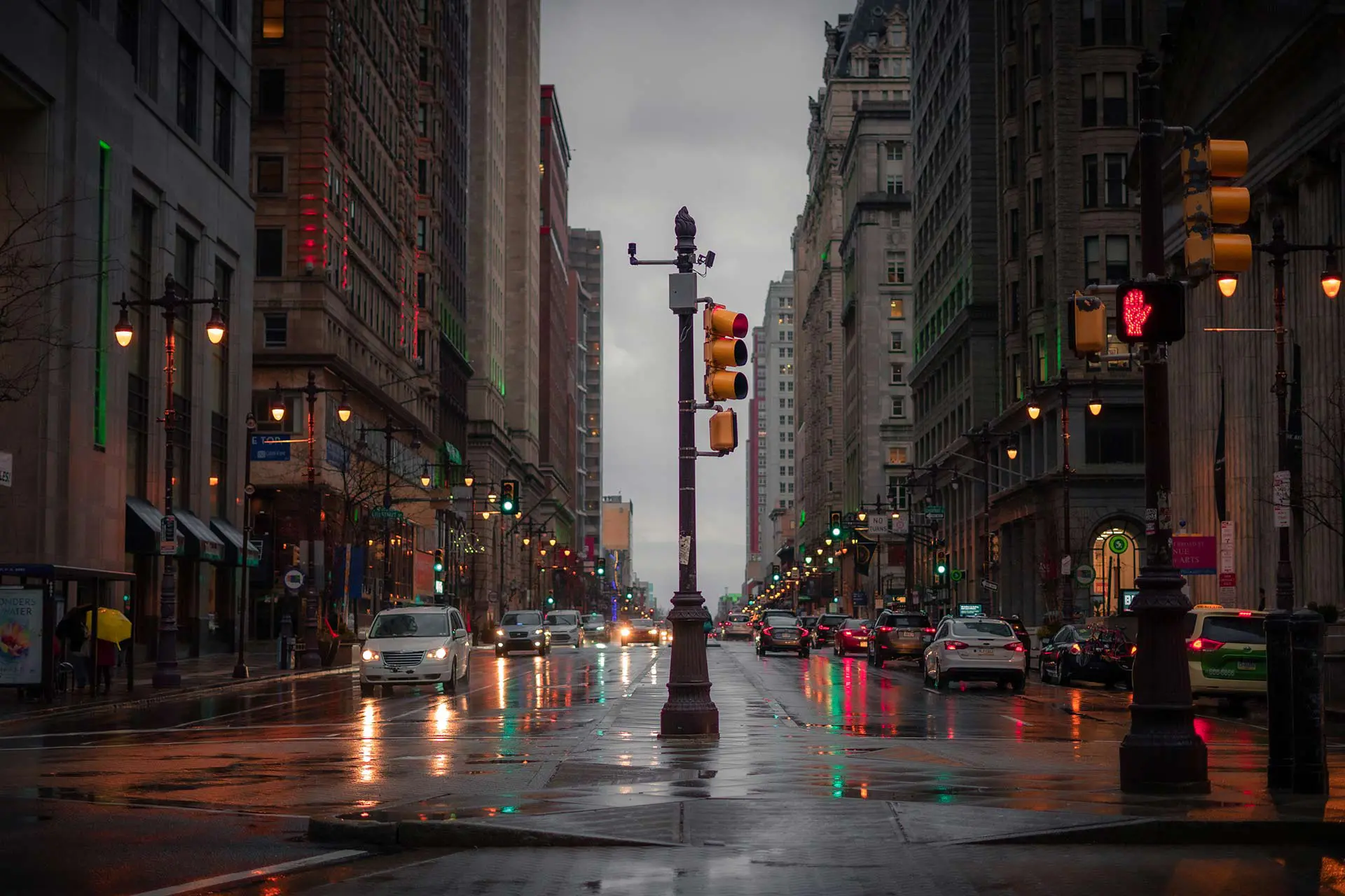 Busy city traffic on a rainy evening